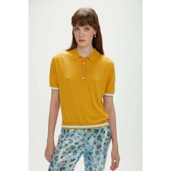 Polo oversize con bottoni gioiello