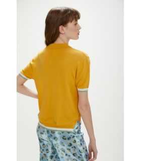 Polo oversize con bottoni gioiello