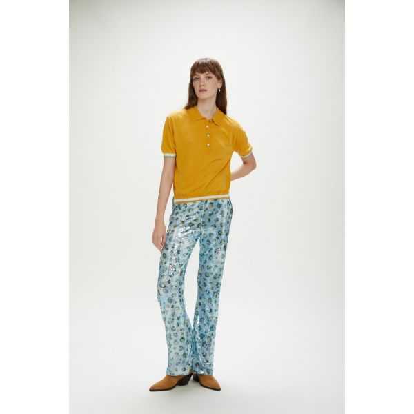 Polo oversize con bottoni gioiello