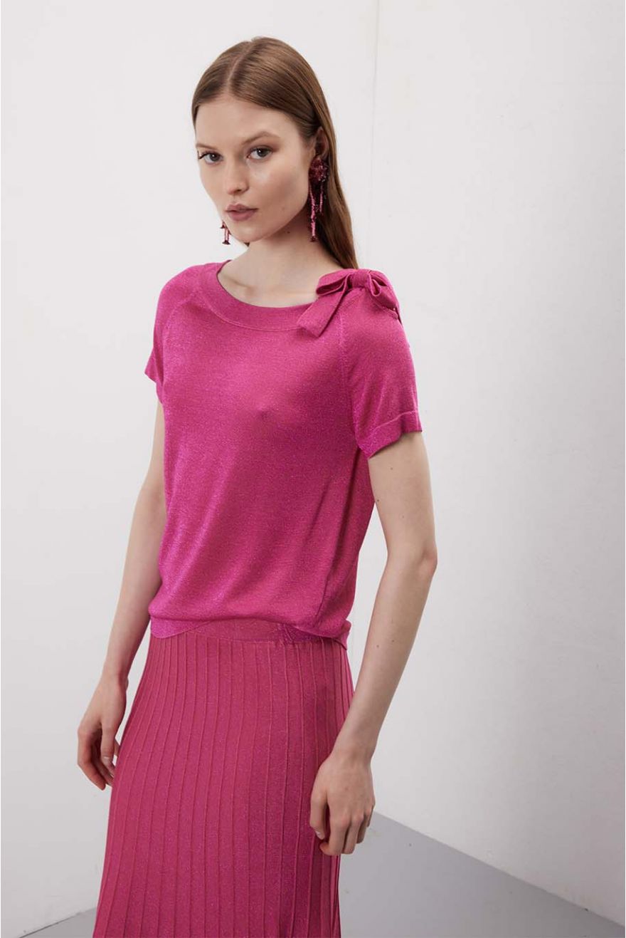 Maglia scollo a barca con fiocco fantasia Unita