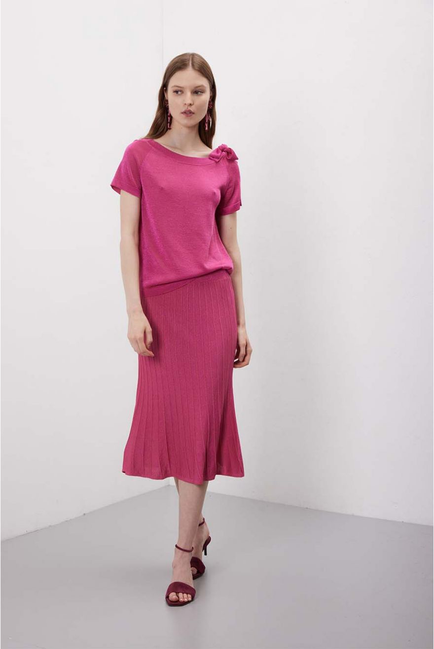 Maglia scollo a barca con fiocco fantasia Unita