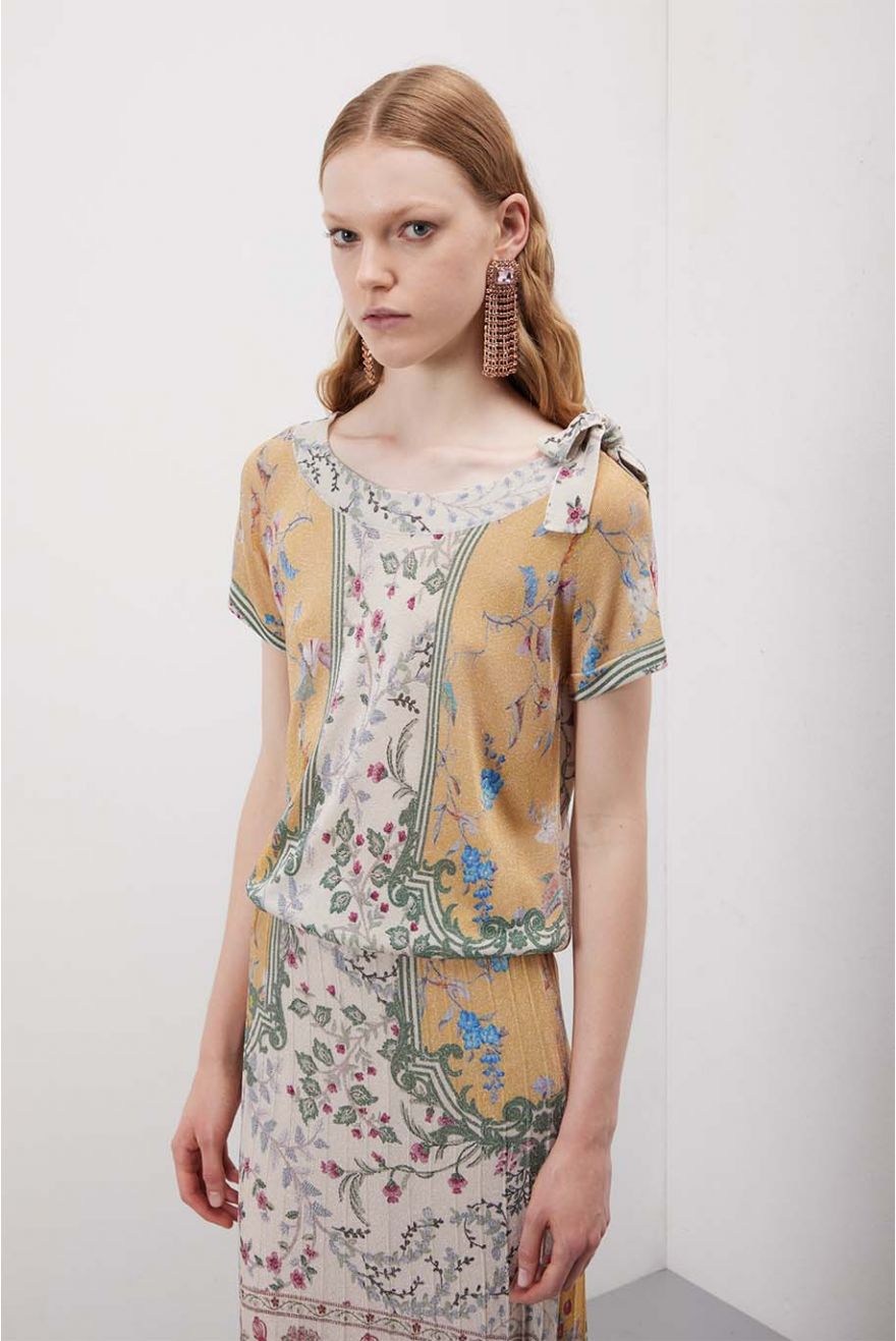 Maglia scollo a barca con fiocco in pattern Wallpaper