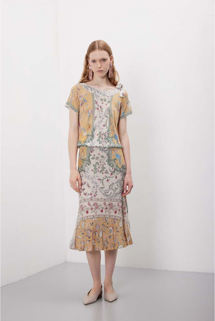 Maglia scollo a barca con fiocco in pattern Wallpaper