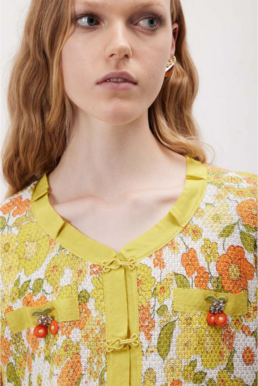 Giacca stile Chanel con motivo Seventy