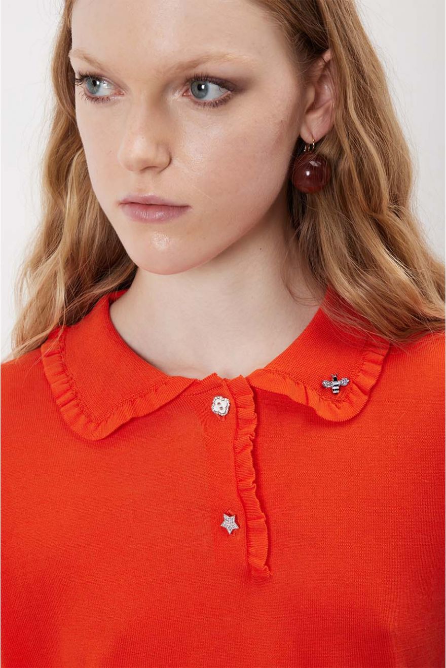 Maglia over con scollo a V e bordi a contrasto